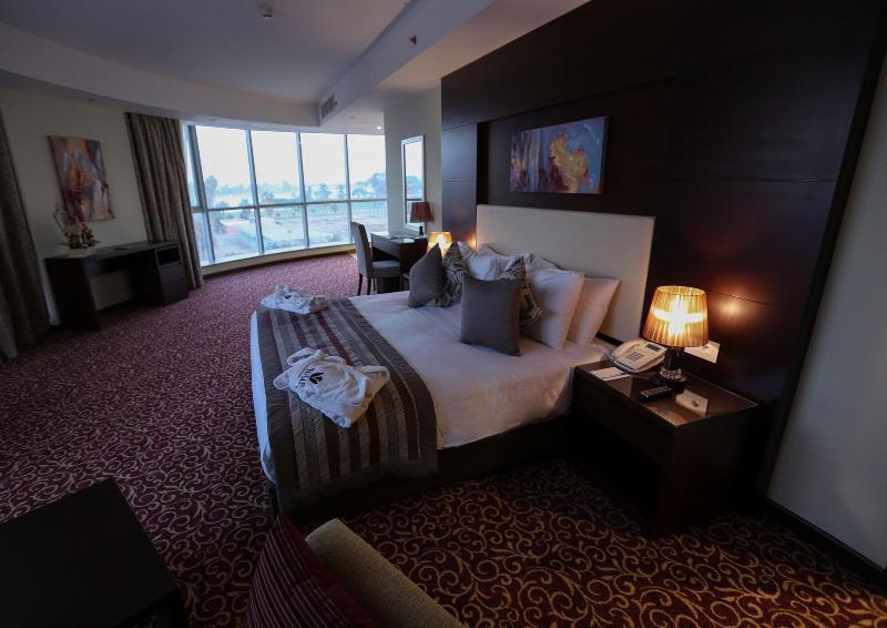 Tolip El Forsan Hotel Ismá'ílíja Exteriér fotografie A bedroom at the hotel